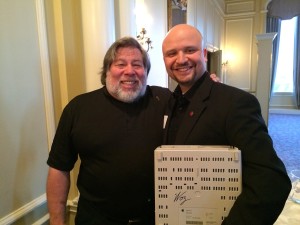 Steve Wozniak on the left, Marcel Brown on the right, and the Apple IIgs with Woz signature.